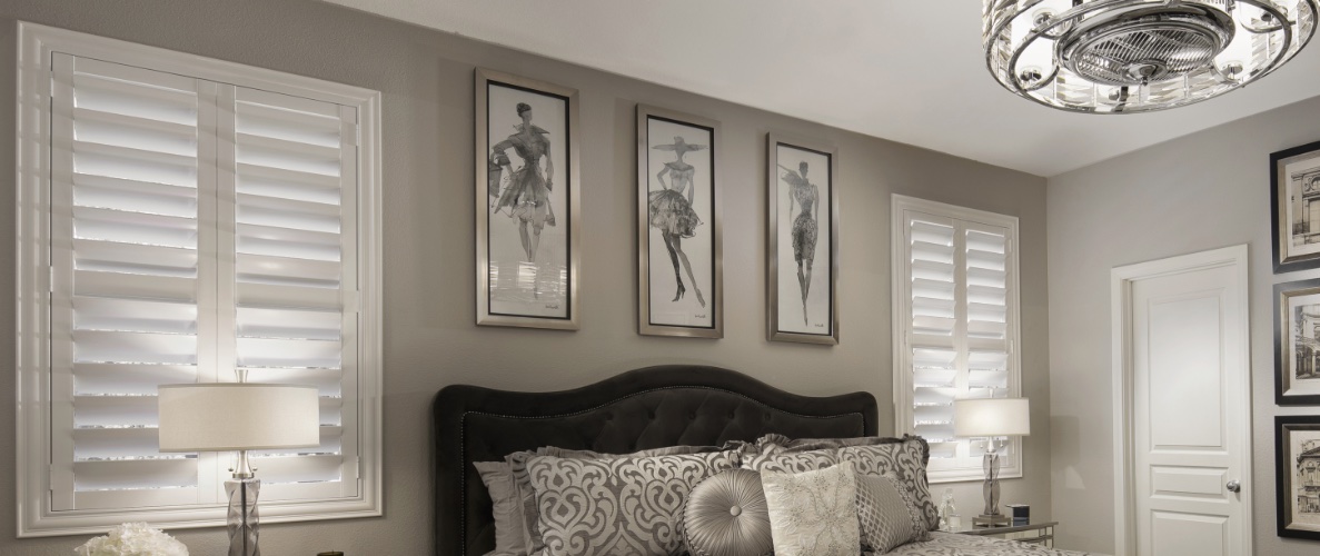 Plantation shutters in a bedroom